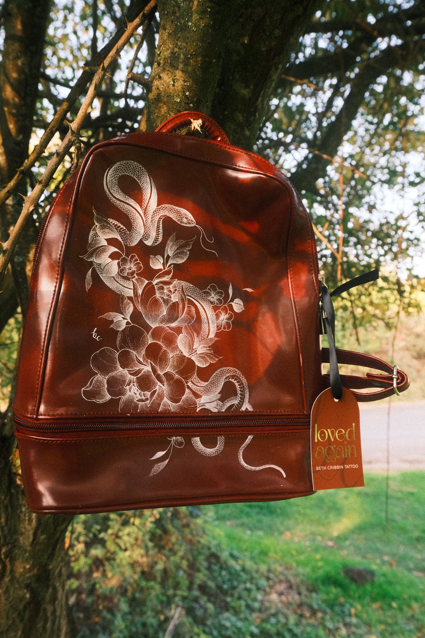 Snake and Peonies Burgundy Backpack